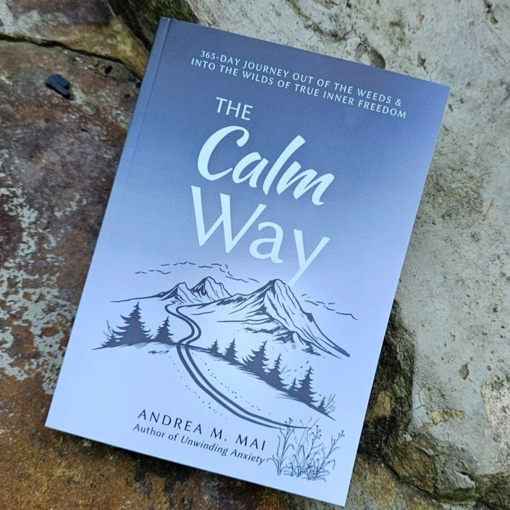 The Calm Way book set on rocks: The Calm Way: 365-Day Journey Out of the Weeds & Into the WIlds of True Inner Freedom